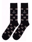 Chaussettes Socksandco avec motif de mariés et détail amigo del novio en noir